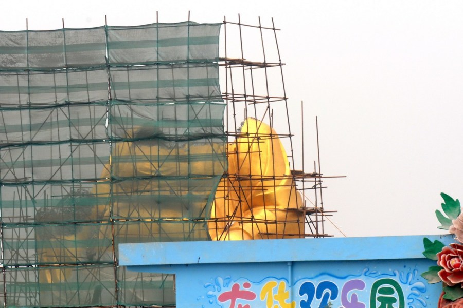 洛陽(yáng)大背頭彌勒佛“整容” 頭部被移走