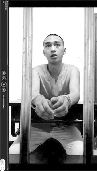 在看守所里的陳明燦。視頻截圖