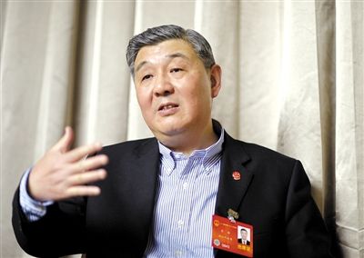 今年全國兩會期間，全國人大代表、浙江高院院長齊奇接受記者采訪。新京報記者 陳杰 攝