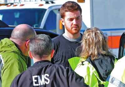 嫌犯接受詢問(wèn)。新華社/美聯(lián)