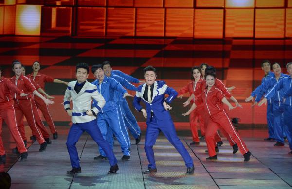 《小蘋果》、《最炫民族風》等廣場舞曲將會有全國統(tǒng)一、編排科學、帶給人正能量的全新動作。 CFP 資料