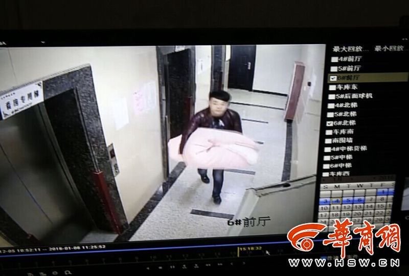 西安一小偷將保險(xiǎn)箱包在被子里離開 過程僅15分鐘